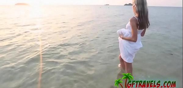  Hot blond girlfriend gets aroused by the beach and gives her lucky man a blowjob